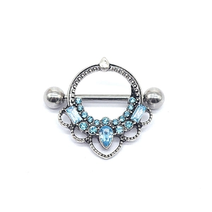 Surgical steel nipple ring featuring a round pendant with sparkling light blue crystals