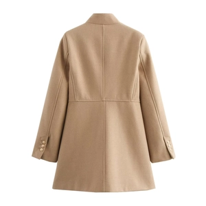Detail view of camel wool coat back featuring tailored waist and buttoned cuffs