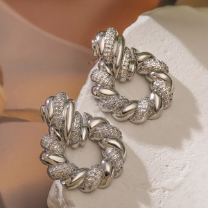 Chic 18K gold plated twisted hoop earrings with shimmering zircons on white stone
