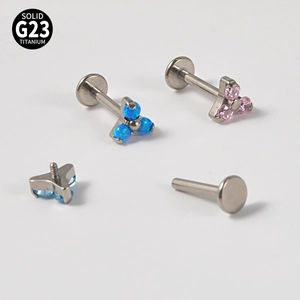 G23 titanium labret studs with triangle blue opal and pink zircon clusters