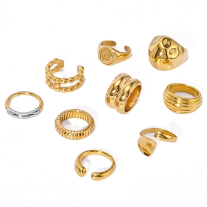 Collection of oversized irregular gold stainless steel rings with geometric patterns