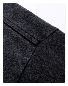 Macro detail of fine stitching on dark gray vintage cotton long sleeve t-shirt