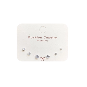 Three-piece set of sparkling cubic zirconia stud earrings in varied sizes on a display card