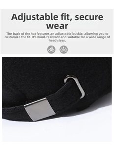 Macro shot of the adjustable metal buckle on back of black winter wool baseball cap