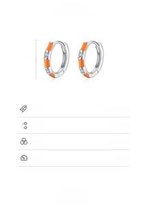 Detailed view of 925 sterling silver hoop earrings with orange enamel and diamond accents