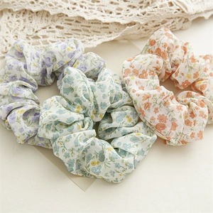 Floral print chiffon scrunchies set in blue and orange colors for elegant hair styling