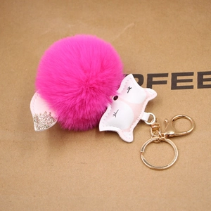Fuchsia faux fur fox pompom keychain with gold metal clasp for bags and backpacks
