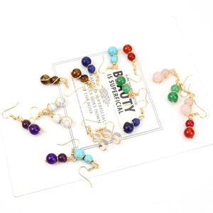 Handmade gold wire-wrapped earrings with natural gemstone round beads in various colors