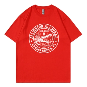 Red Alligator Alcatraz graphic cotton T-shirt featuring a white crocodile print design