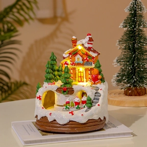 Lighted musical Christmas candy shop house with gingerbread man and snowy trees decor