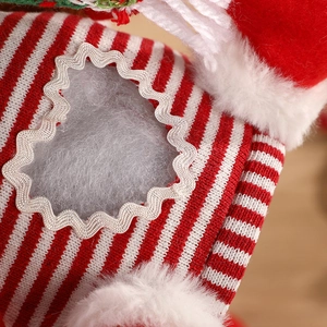 DIY Christmas felt gift bag featuring red white striped knit and plush trim detail
