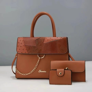 Three-piece brown women's handbag set with ostrich and snake texture and chain detail