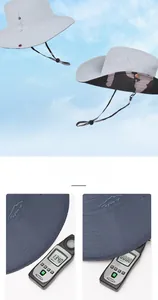 Detailed view of foldable outdoor sun hat with adjustable wind cord and camouflage lining