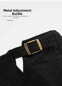 Detail of adjustable metal buckle and breathable fabric on a black newsboy cap