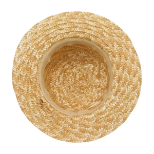 Detail of natural straw sun hat showing interior woven texture and sweatband