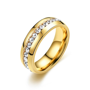 Polished gold stainless steel band ring with channel set white cubic zirconia stones