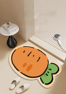 Detail of soft absorbent carrot bath mat with non-slip backing for modern bathroom
