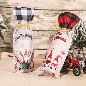 Set of 2 Christmas wine bottle covers with gnome patterns in red and white plaid