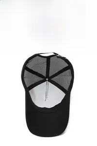 Detail view of the breathable black mesh back and inner structure of the baseball cap
