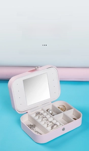 Pink faux leather jewelry box featuring a dual-layer design with HD mirror and ring slots