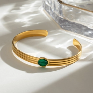 Gold stainless steel textured cuff bracelet with green oval agate stone inlay