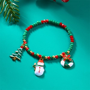Detailed view of Christmas beaded bracelet with snowman and tree enamel charms