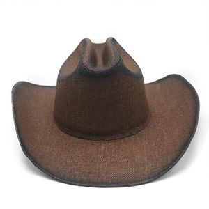 Distressed dark brown straw cowboy hat with a wide brim and vintage gradient finish