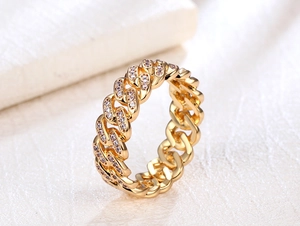 Macro shot of 8mm gold plated cuban link ring featuring micro-pave white zircon stones