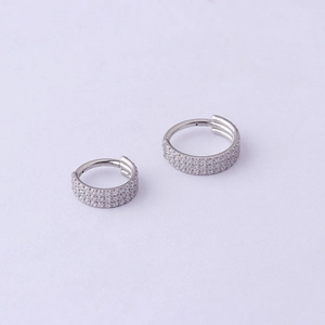 Silver stainless steel nose rings with three rows of cubic zirconia crystals in two sizes