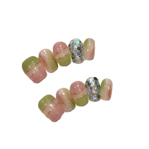 Handmade gradient green press-on nails with gold wire and silver glitter accents
