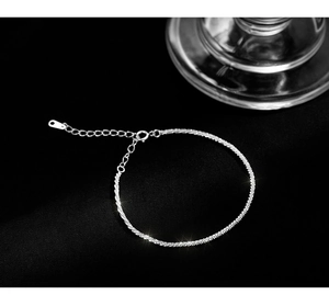 Macro shot of S925 sterling silver chain with shimmering finish and spring clasp