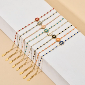 Minimalist gold stainless steel beaded bracelets with religious medal pendants