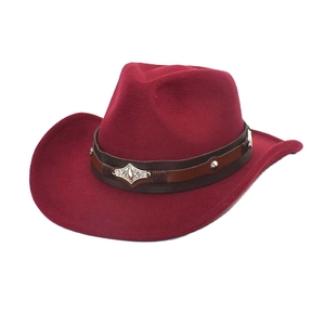 Detail of burgundy wool felt cowboy hat with brown leather band and metallic studs