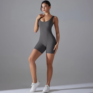 Detailed view of dark grey athletic bodysuit featuring U-neck and wide shoulder straps