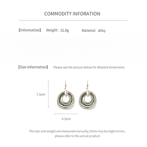 Size details of ethnic layered circular drop earrings in gold, silver, and teal alloy