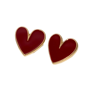 Minimalist red heart stud earrings with elegant gold wavy metal border on white background