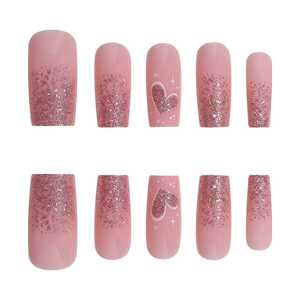 Pink gradient glitter press-on nails with heart designs in medium-long square shape