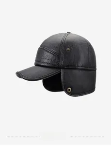 Detail of black winter leather baseball cap showing fold-down ear flaps and metal rivets