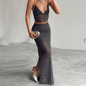 Women's two-piece black mesh set with white polka dots, crop top and high waist maxi skirt