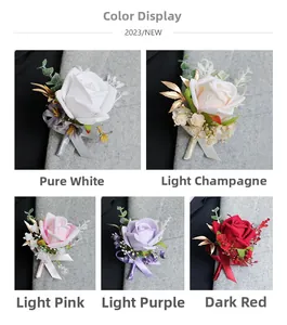 Close-up of five colorful wedding boutonnieres featuring roses and gold leaf accents