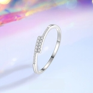 Detail view of double-row zirconia pavé setting on a minimalist S925 sterling silver ring