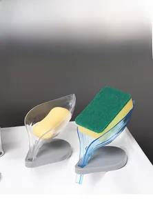 Detail of leaf-shaped soap holder with drainage design for sponges and soap bars