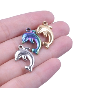 Detailed comparison of mini dolphin pendants in silver, gold, and colorful finishes