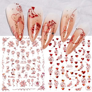 3D metallic red and gold nail stickers with roses and hearts for elegant manicures