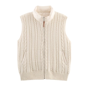 Detailed close-up of cable-knit texture and stand collar on beige padded vest