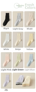 Cotton crew socks for women, breathable solid color design, comfortable daily wear detail view.
