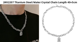 Macro detail of titanium steel chain with rectangular rhinestone pendant for men and women