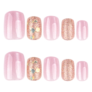 Short square press-on nails with pink cat eye glitter and rose gold sequin accents