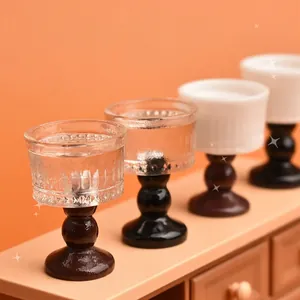 Miniature dollhouse Santa cups set with transparent and white resin on sphere bases