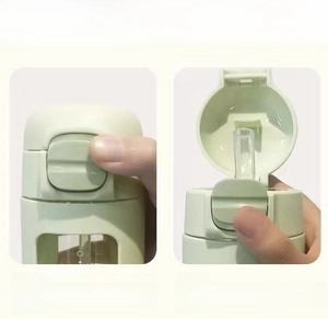 Detail of safety lock mechanism on a light green portable bottle with straw